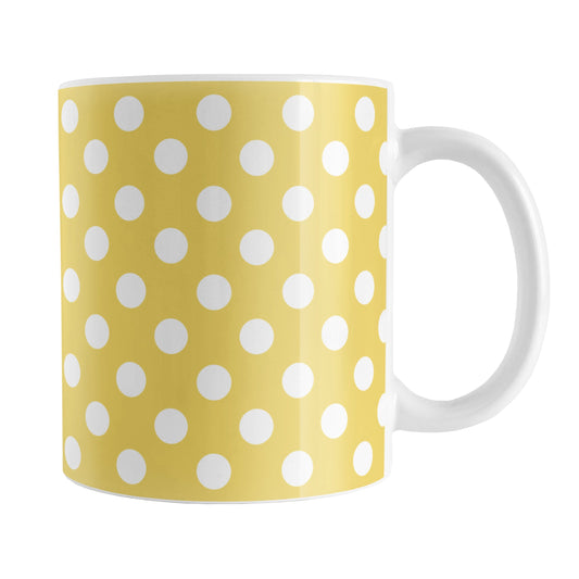 Yellow Polka Dot Mug (11oz) at Amy's Coffee Mugs. A ceramic coffee mug designed with a pattern of white polka dots over a yellow background color that wraps around the mug up to the handle.