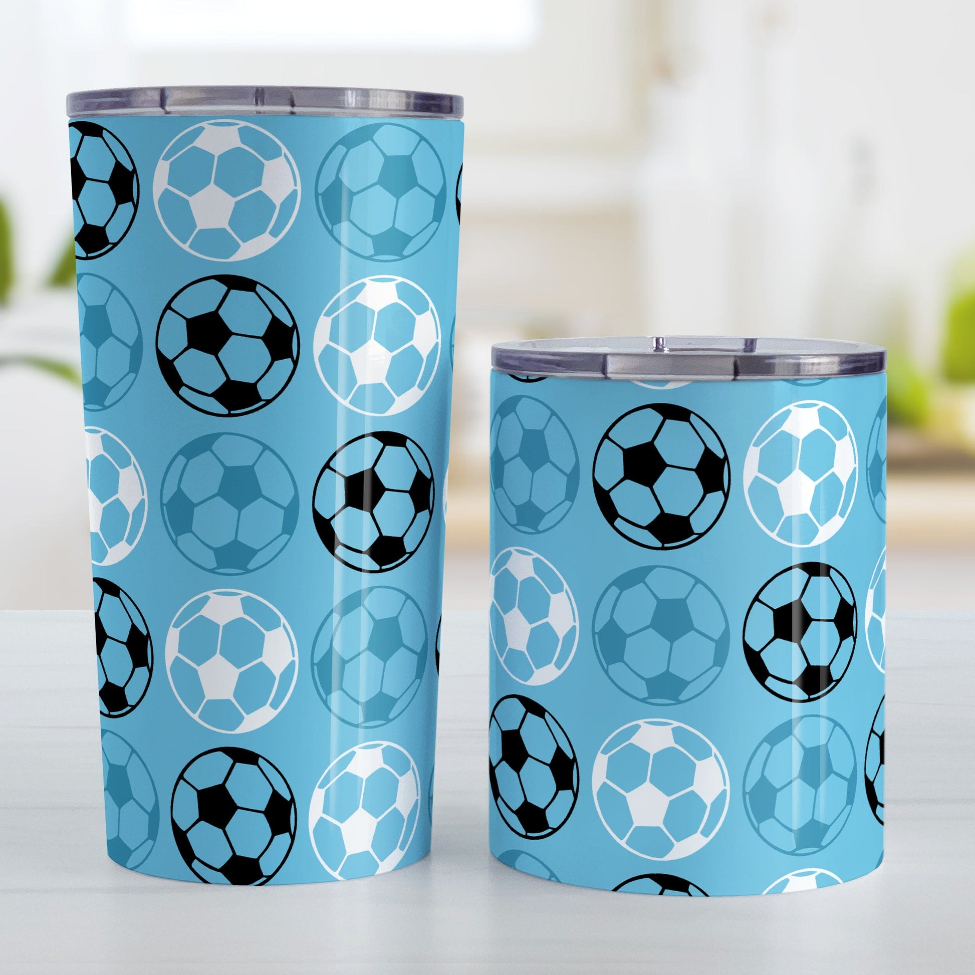 Alternating Blue Soccer Balls Tumbler Cup at Amy's Coffee Mugs. Photo shows both sized cups next to each other