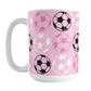 White 15oz mug with pink background and soccer ball pattern