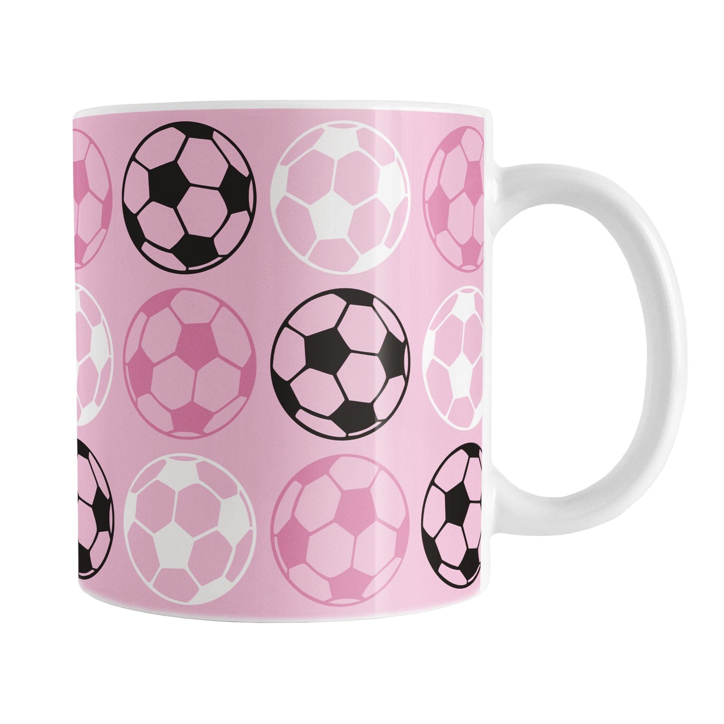 White 11oz mug with pink background and soccer ball pattern