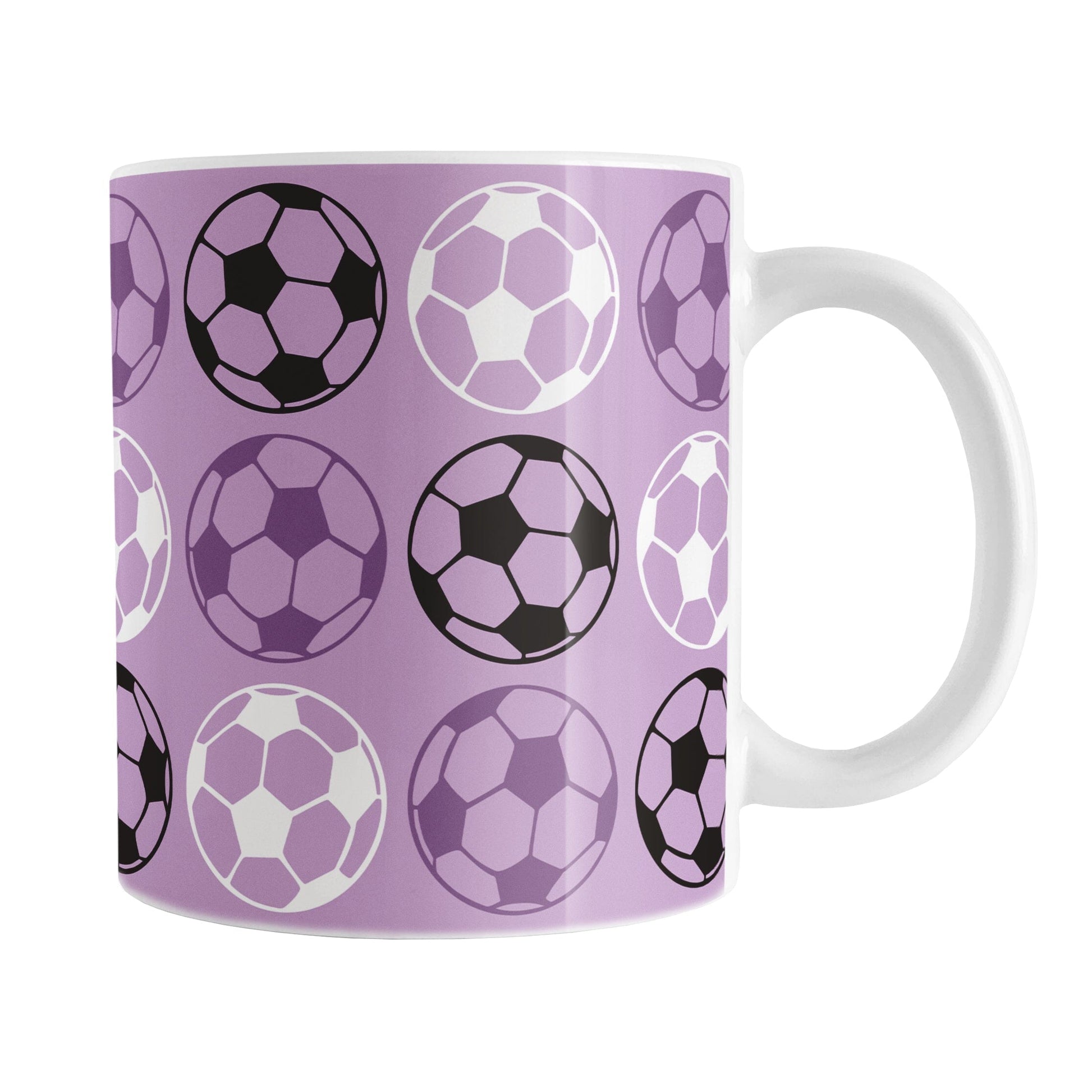 An 11oz white mug with a purple soccer ball pattern, over a white background