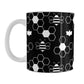 Black and White Bee Mug (11oz) at Amy's Coffee Mugs. A ceramic coffee mug designed with white line and silhouette bees and honeycomb in a sleek pattern over a black background color that wraps around the mug up to the handle.