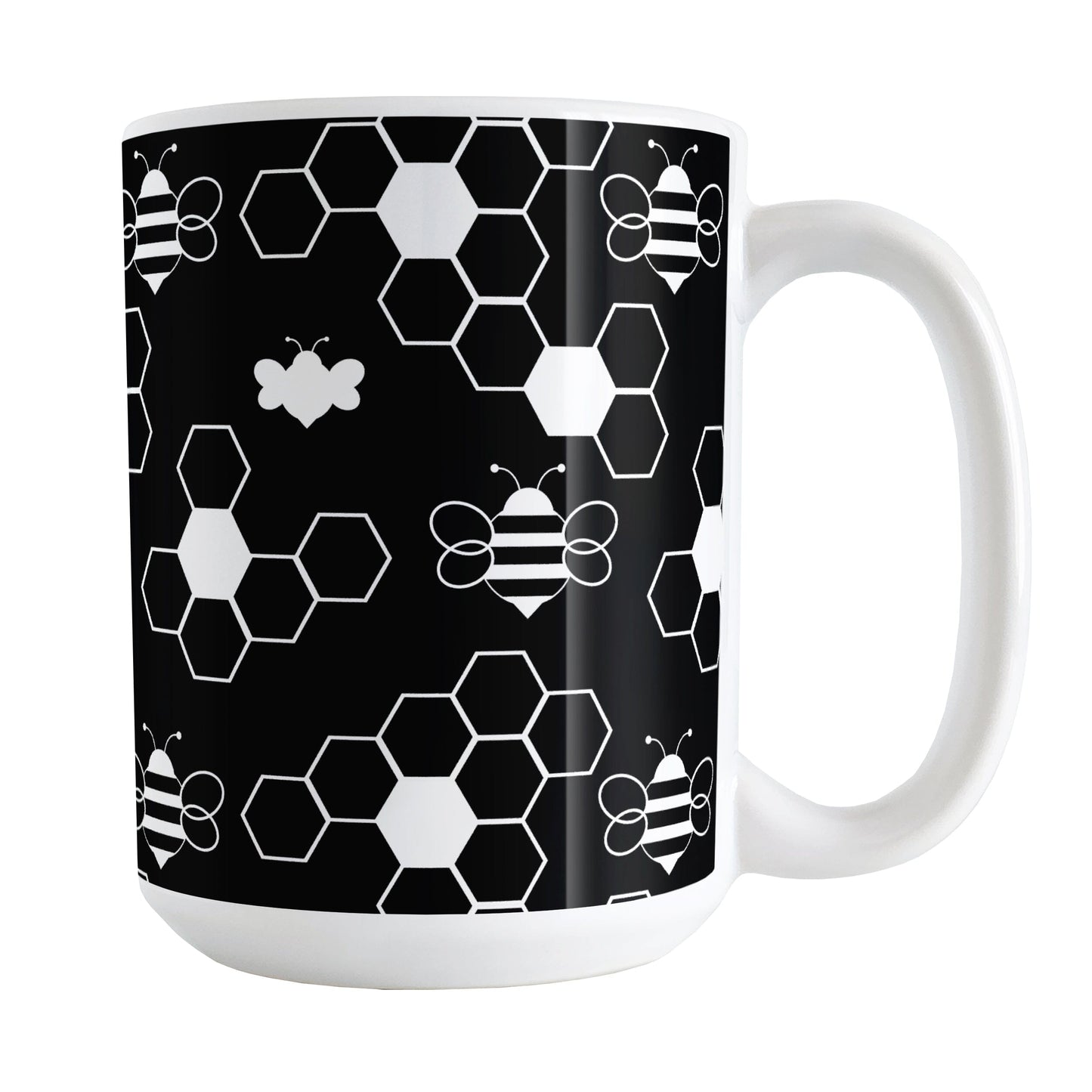 Black and White Bee Mug (15oz) at Amy's Coffee Mugs. A ceramic coffee mug designed with white line and silhouette bees and honeycomb in a sleek pattern over a black background color that wraps around the mug up to the handle.