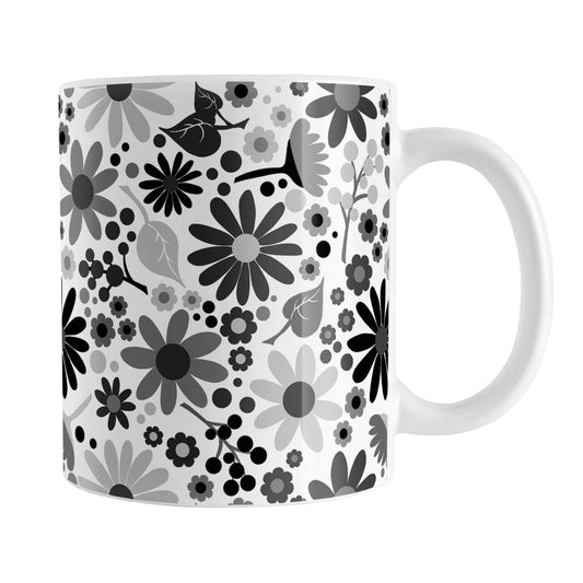 Black and White Flowers Mug (11oz) at Amy's Coffee Mugs. A ceramic coffee mug designed with pretty floral wildflowers in a stylish black and white color palette, with black, gray, and white flowers and leaves in a pattern that wraps around the mug up to the handle.