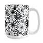 Black and White Flowers Mug (11oz) at Amy's Coffee Mugs. A ceramic coffee mug designed with pretty floral wildflowers in a stylish black and white color palette, with black, gray, and white flowers and leaves in a pattern that wraps around the mug up to the handle.