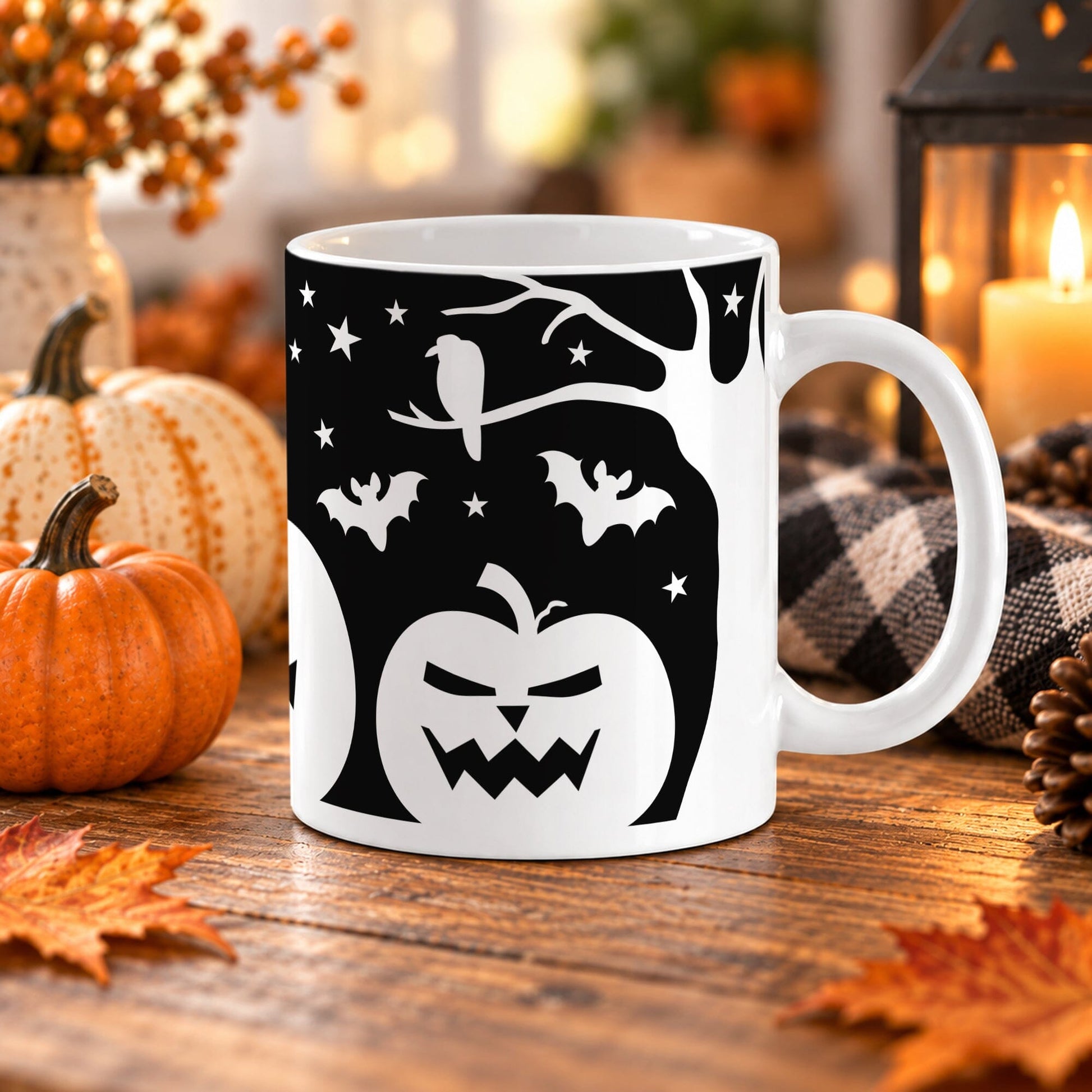 White 11 oz ceramic Halloween mug with black background, white jack-o'-lanterns, bats, stars, raven, and bare tree branches. The mug sits on a wooden table with fall decor around it.