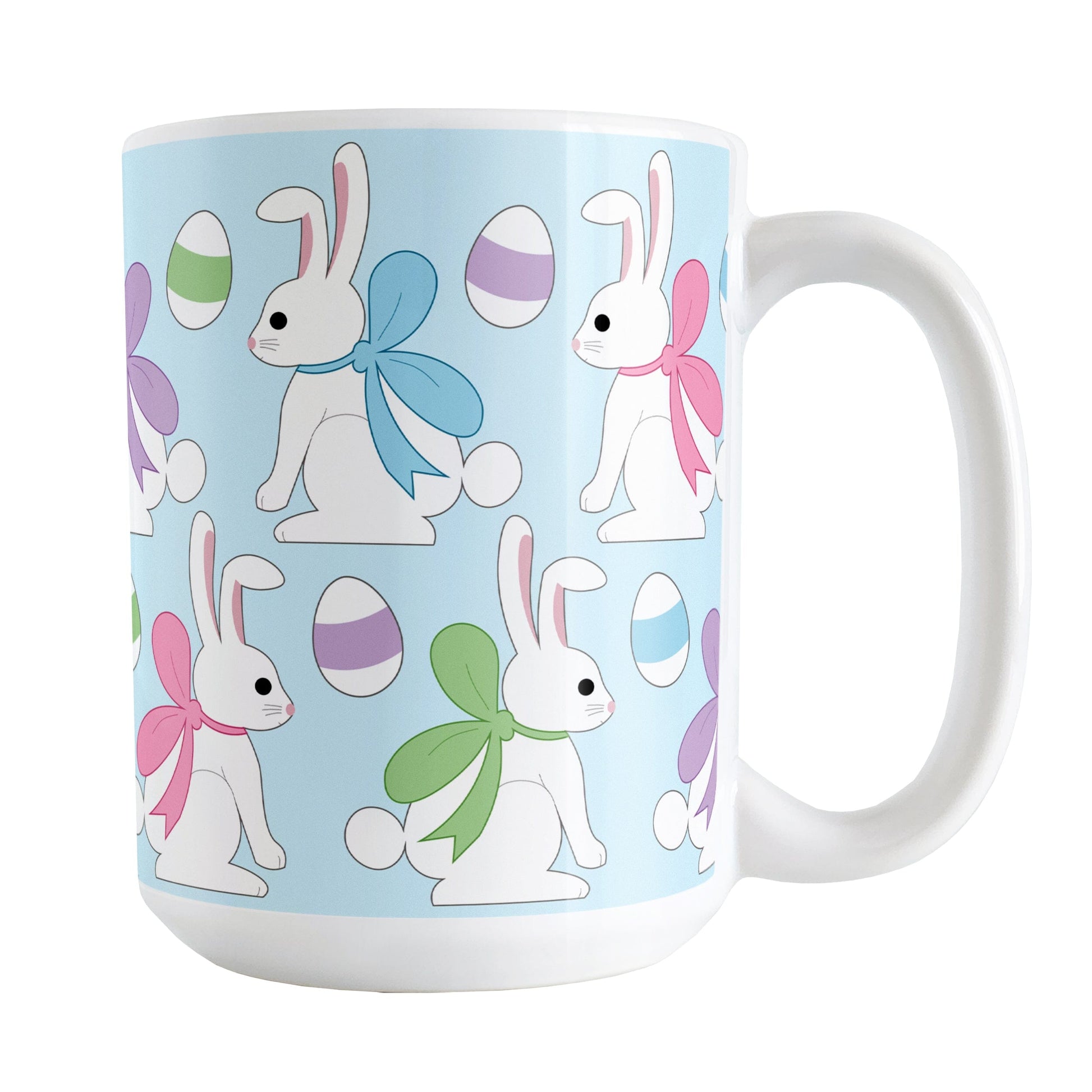 15oz mug with Easter-themed design featuring bunnies and eggs on a light blue background