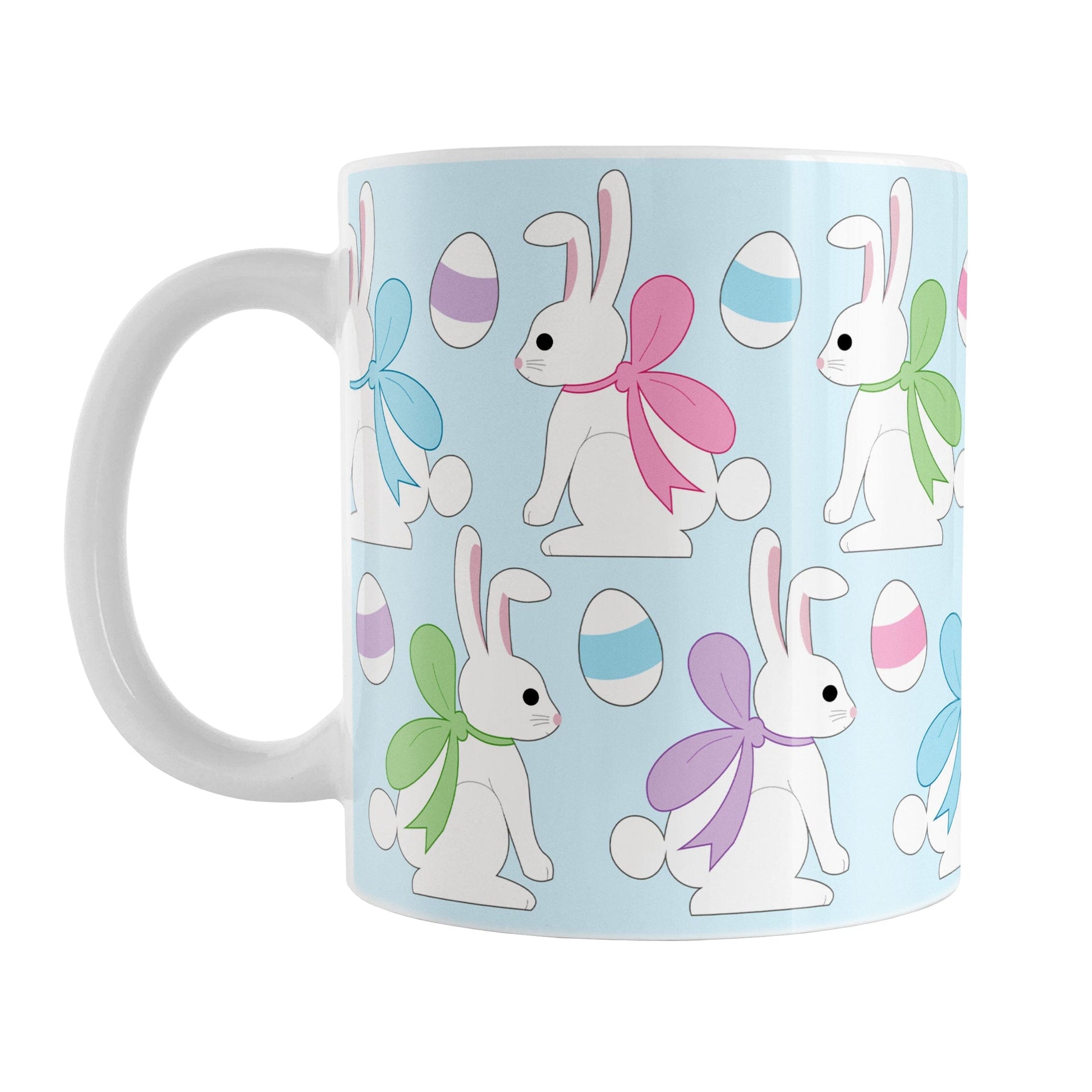 11oz mug with Easter-themed design featuring bunnies and eggs on a light blue background