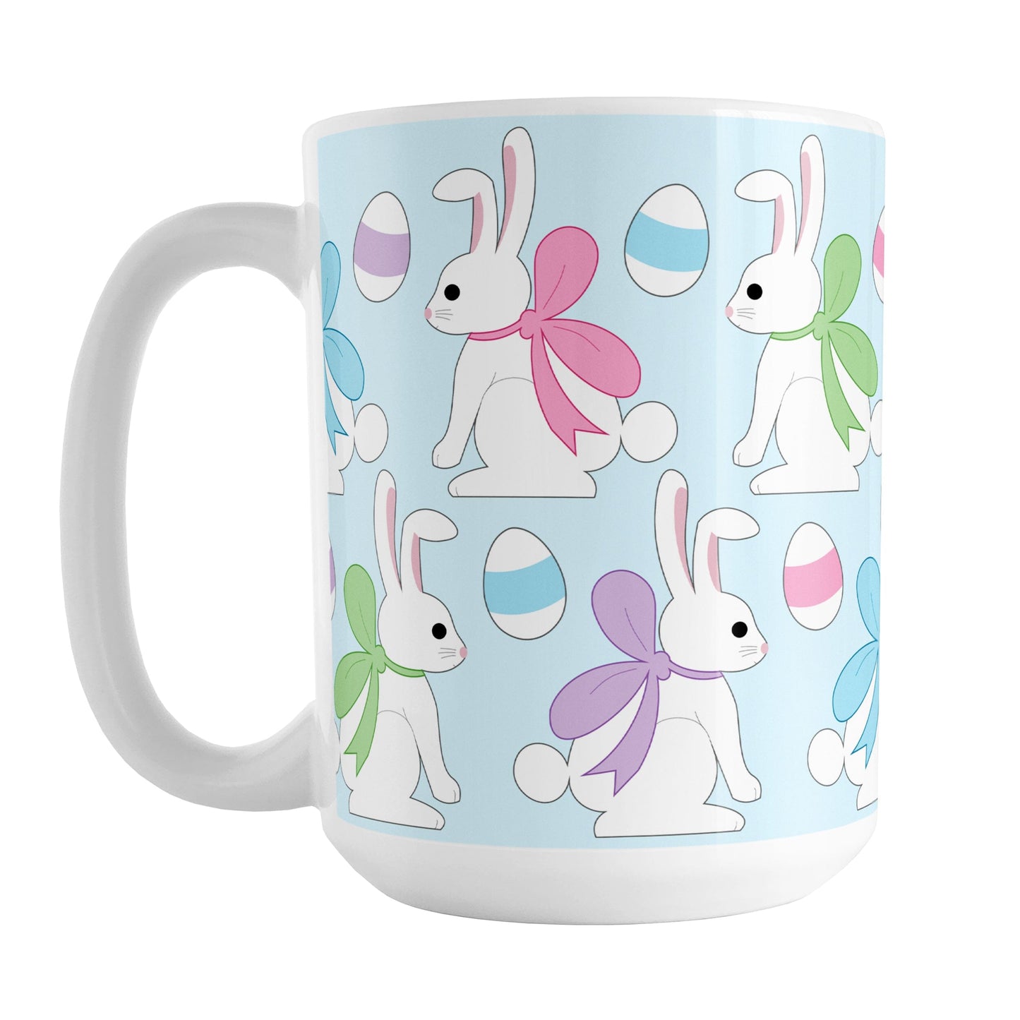 15oz mug with Easter-themed design featuring bunnies and eggs on a light blue background