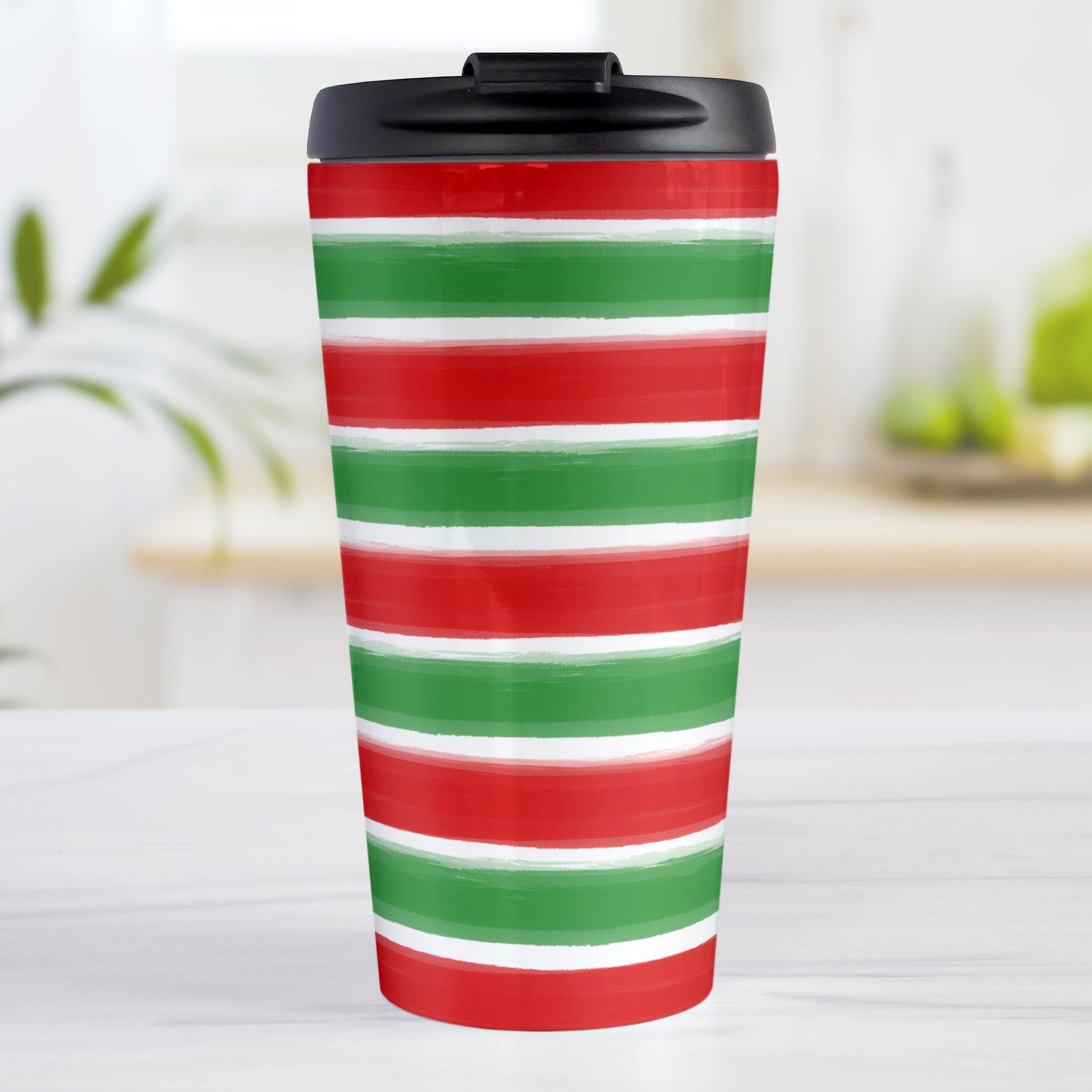 Christmas Paint Brush Strokes Travel Mug (15oz) at Amy's Coffee Mugs. A stainless steel travel mug featuring a print of artistic paint brush strokes horizontally across the travel mug in alternating colors of red and green to celebrate the Christmas holiday.