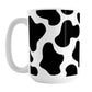 Cow Print Mug (15oz) at Amy's Coffee Mugs. A ceramic coffee mug designed with a black and white animal print pattern inspired by the spots on a cow that wraps around the mug.