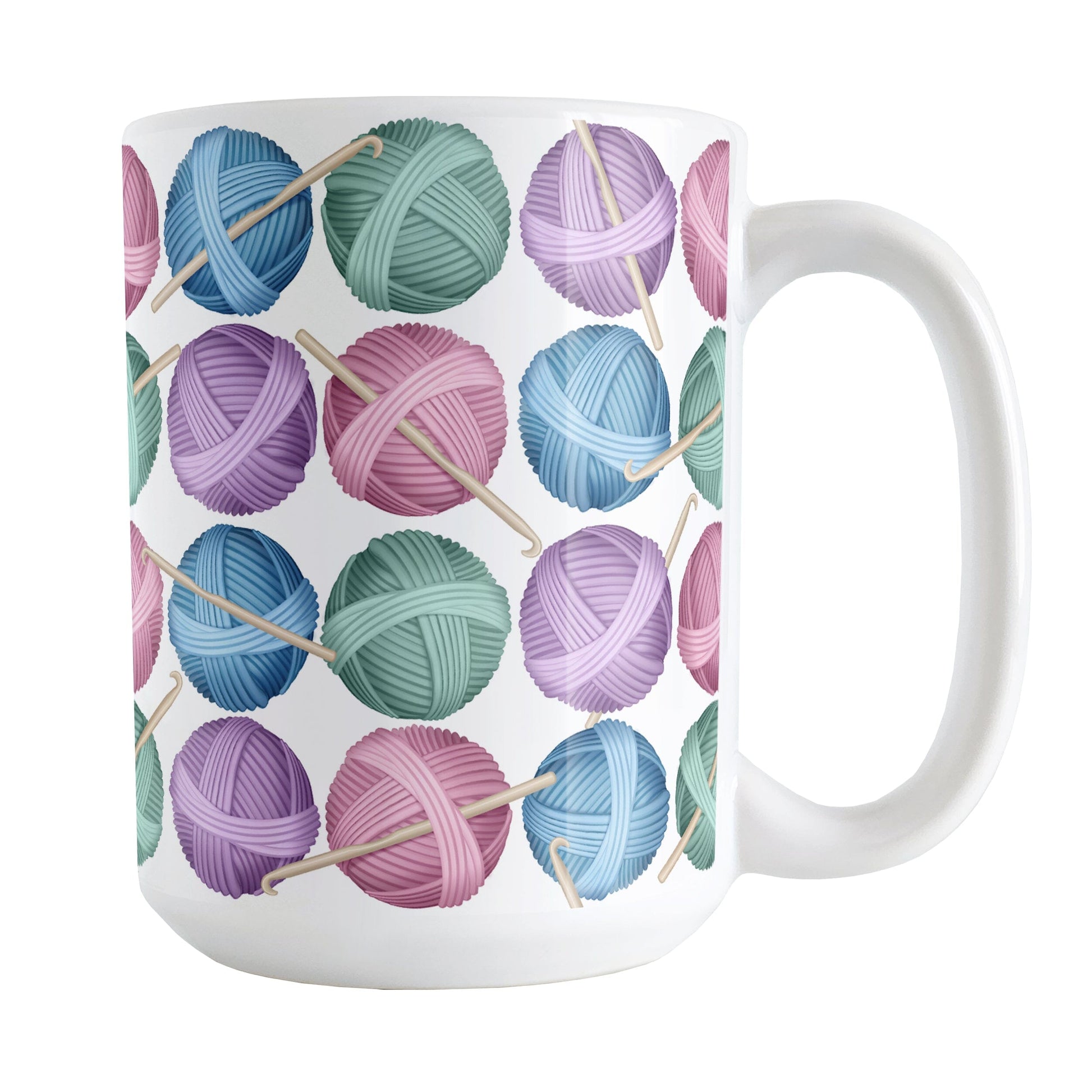 Crochet Yarn Pattern Mug (15oz) at Amy's Coffee Mugs. A ceramic coffee mug designed with colorful balls of yarn in blue, pink, purple, and mint green with crochet hooks in a pattern that wraps around the mug up to the handle. 