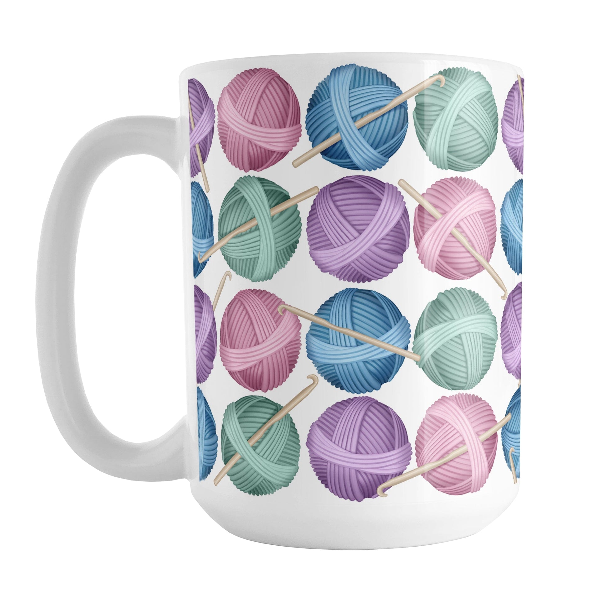 Crochet Yarn Pattern Mug (15oz) at Amy's Coffee Mugs. A ceramic coffee mug designed with colorful balls of yarn in blue, pink, purple, and mint green with crochet hooks in a pattern that wraps around the mug up to the handle. 