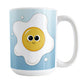 Cute Fried Egg Blue Breakfast Mug (15oz) at Amy's Coffee Mugs. A ceramic coffee mug designed with a cute and happy fried egg on both sides of the mug over a gradient blue background color that wraps around the mug up to the handle.