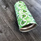 20oz Cute Green Frog Pattern Tumbler Cup laying on a weathered wood surface