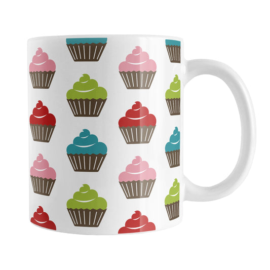 Cute Modern Cupcakes Mug (11oz) at Amy's Coffee Mugs. A ceramic coffee mug designed with simple, modern cupcakes with pink, turquoise, green, and red frosting in brown cupcake wrappers in a pattern that wraps around the mug up to the handle.