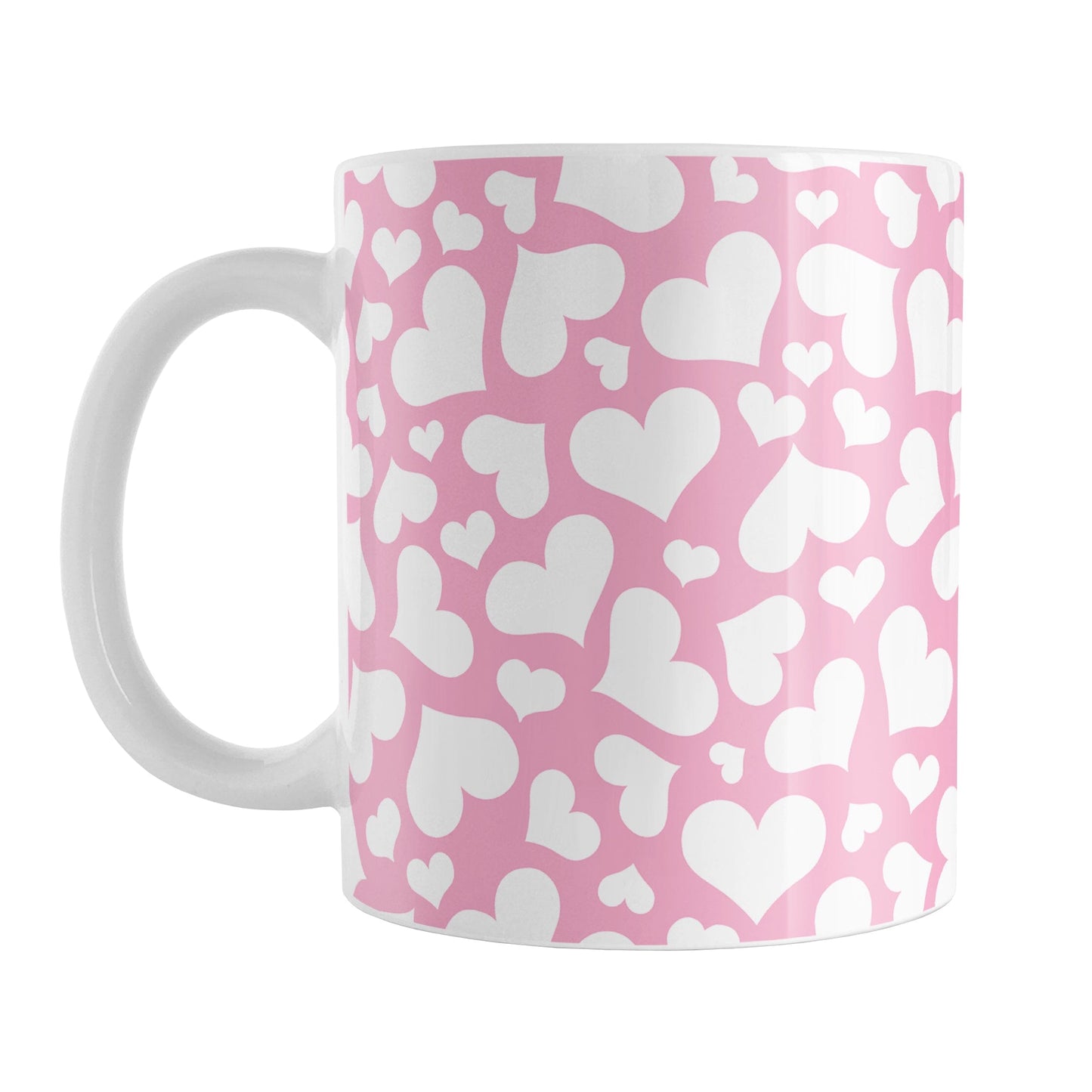 Cute White Hearts on Pink Mug (11oz) at Amy's Coffee Mugs. A ceramic coffee mug designed with a multi-directional pattern of cute white hearts over a pink background color that wraps around the mug to the handle.