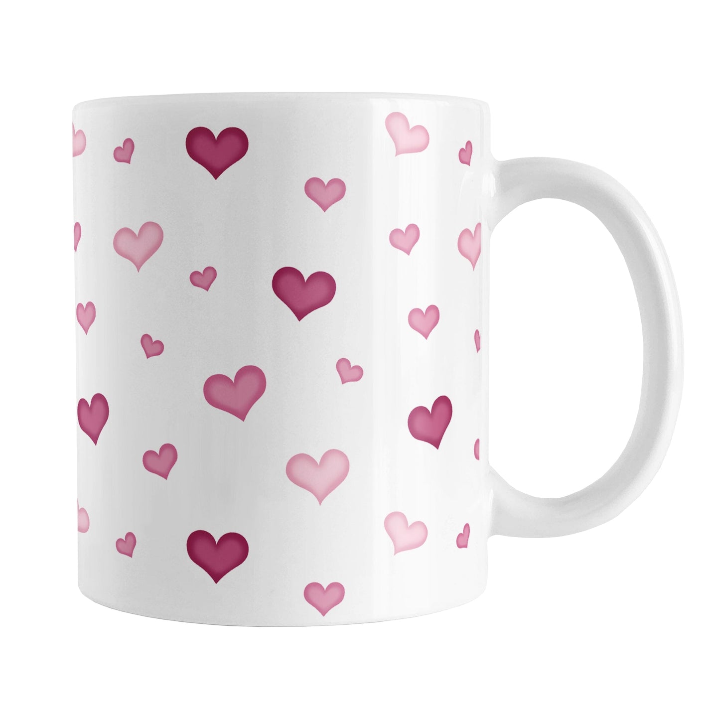 Dainty Cute Pink Hearts Mug (11oz) at Amy's Coffee Mugs. A ceramic coffee mug designed with a print of cute and dainty hand-drawn pink hearts in different shades of pink in a pattern that wraps around the mug up to the handle. 
