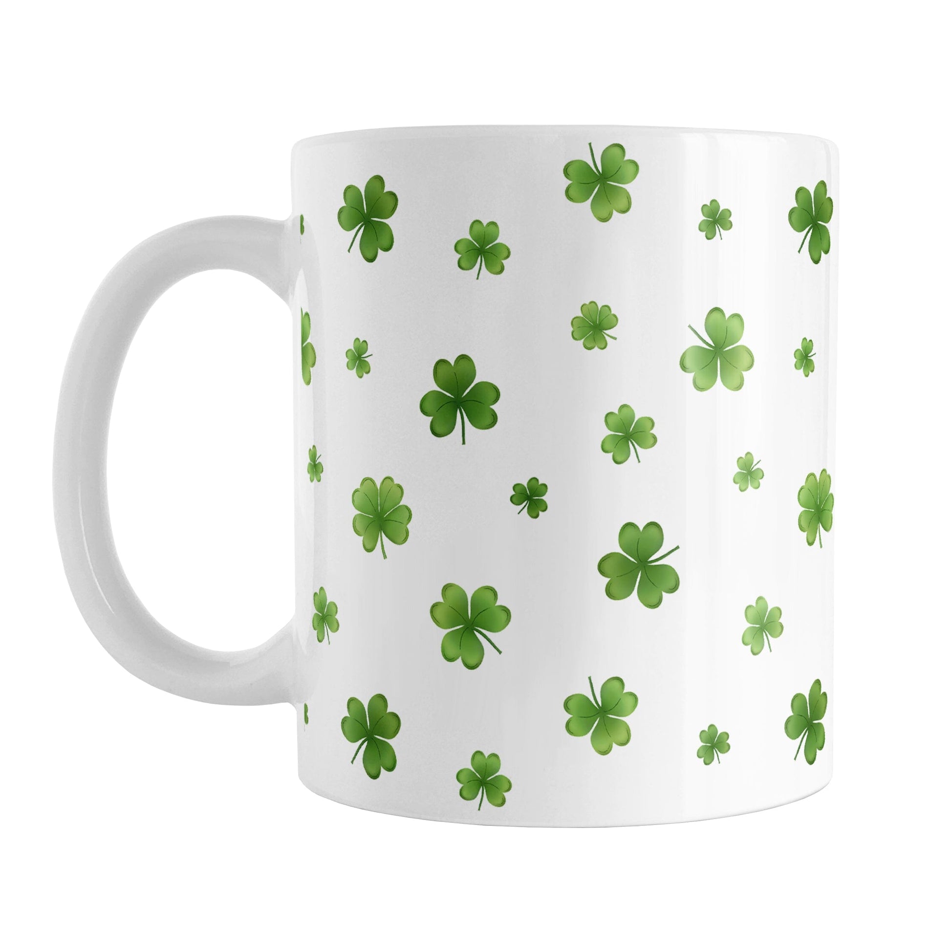 Dainty Shamrocks and Clovers Mug (11oz) at Amy's Coffee Mugs. A ceramic coffee mug designed with hand-drawn green shamrocks and 4-leaf clovers in a dainty minimalist pattern that wraps around the mug up to the handle.