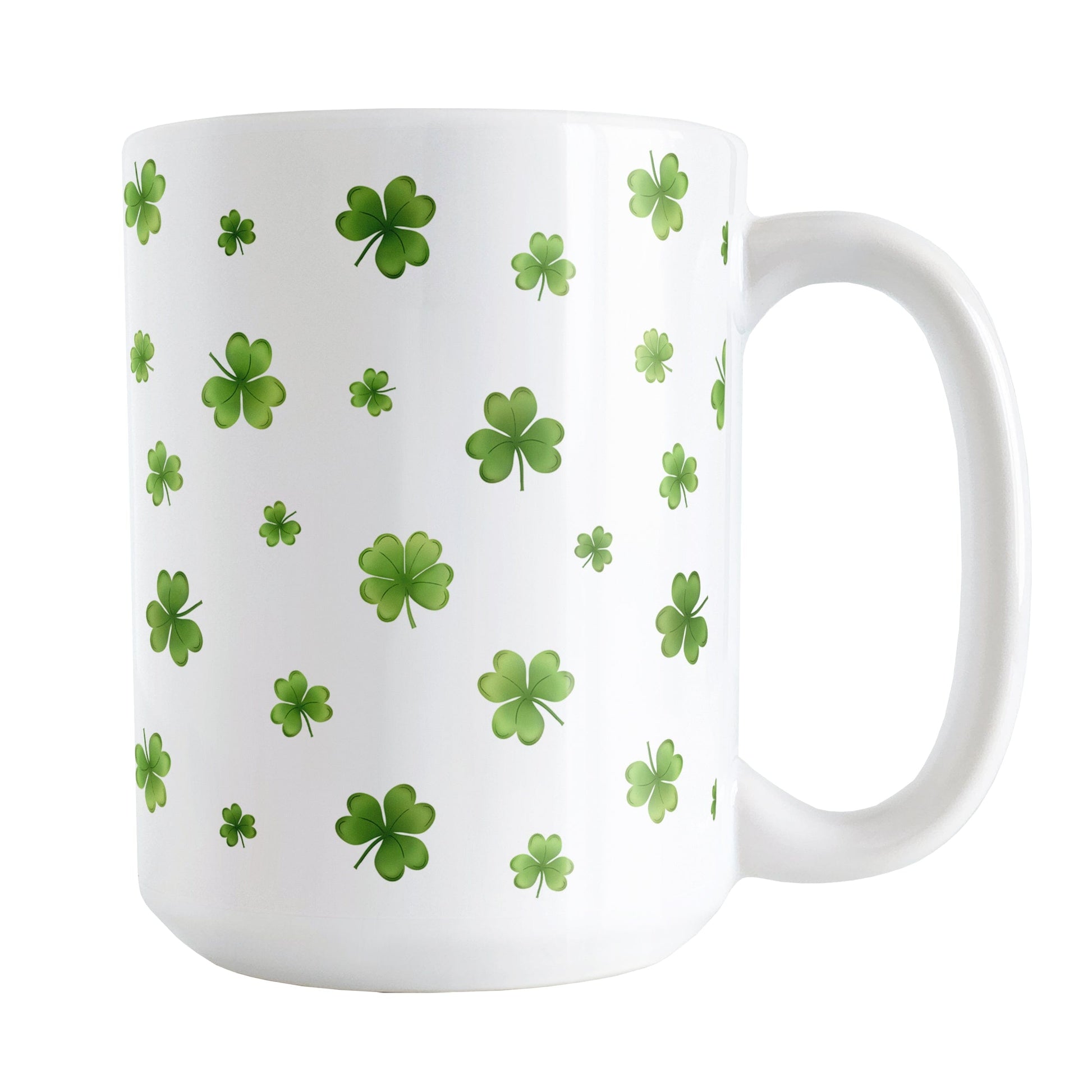 Dainty Shamrocks and Clovers Mug (15oz) at Amy's Coffee Mugs. A ceramic coffee mug designed with hand-drawn green shamrocks and 4-leaf clovers in a dainty minimalist pattern that wraps around the mug up to the handle.