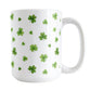 Dainty Shamrocks and Clovers Mug (15oz) at Amy's Coffee Mugs. A ceramic coffee mug designed with hand-drawn green shamrocks and 4-leaf clovers in a dainty minimalist pattern that wraps around the mug up to the handle.
