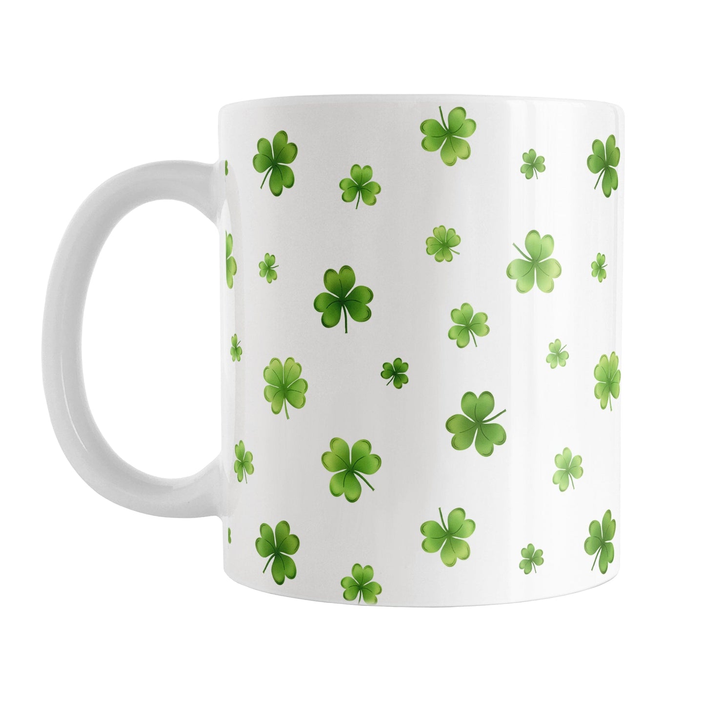 Dainty Shamrocks and Clovers Mug (11oz) at Amy's Coffee Mugs. A ceramic coffee mug designed with hand-drawn green shamrocks and 4-leaf clovers in a dainty minimalist pattern that wraps around the mug up to the handle.