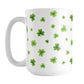 Dainty Shamrocks and Clovers Mug (15oz) at Amy's Coffee Mugs. A ceramic coffee mug designed with hand-drawn green shamrocks and 4-leaf clovers in a dainty minimalist pattern that wraps around the mug up to the handle.
