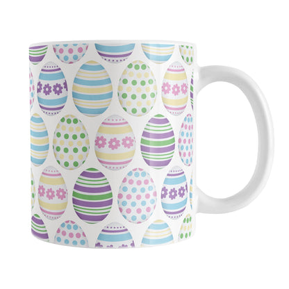 White mug with Easter egg pattern on a white background