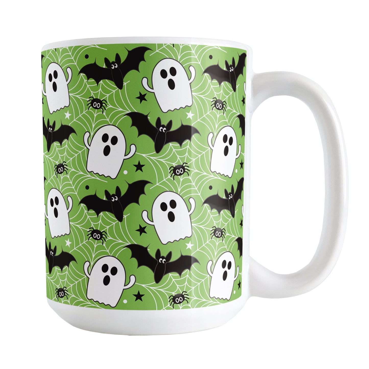 Halloween-themed mug with ghosts, bats, and spiders on a green background