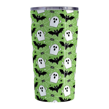 Tumbler with Halloween-themed design featuring ghosts, bats, and spiders on a green background.
