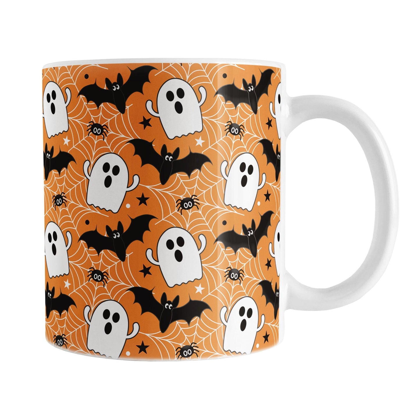 Halloween-themed mug with ghost, bat, and spider design on an orange background
