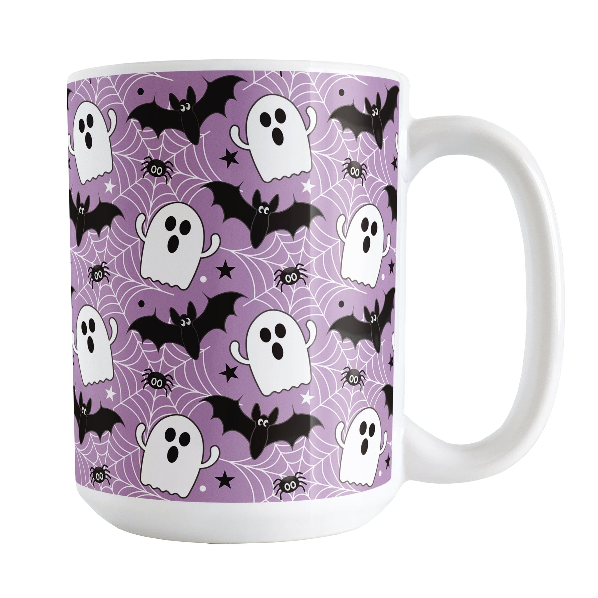 Mug with Halloween-themed design featuring ghosts, bats, and spiders on a purple background.