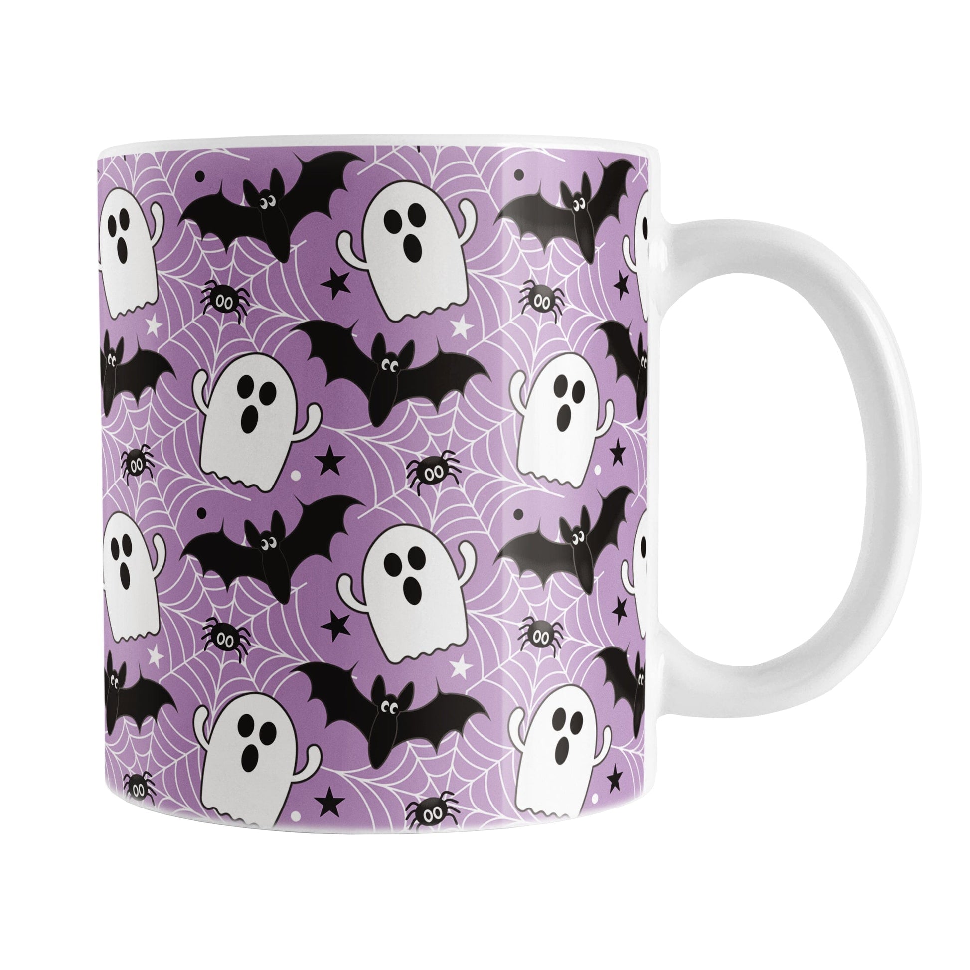 Halloween-themed mug with ghost, bat, and spider pattern on a purple background