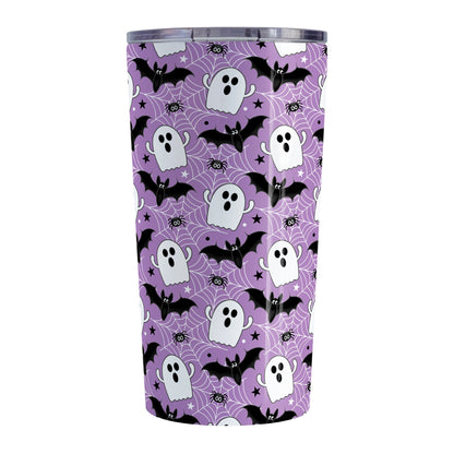 Tumbler with Halloween-themed design featuring ghosts, bats, and spider webs on a purple background.