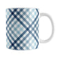 Gradient Blue Gingham Mug (11oz) at Amy's Coffee Mugs. A ceramic mug with a stepped gradient blue gingham pattern that wraps around the mug up to the handle. It's a modern take on a classic black and white check pattern with blue tones progressing from navy blue to light blue. 
