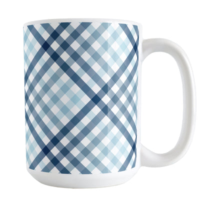 Gradient Blue Gingham Mug (15oz) at Amy's Coffee Mugs. A ceramic mug with a stepped gradient blue gingham pattern that wraps around the mug up to the handle. It's a modern take on a classic black and white check pattern with blue tones progressing from navy blue to light blue. 