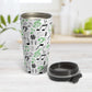 Green Music Notes Pattern Travel Mug (15oz) at Amy's Coffee Mugs. A stainless steel travel mug designed with music notes and symbols in green, black, and gray in a pattern that wraps around the travel mug. Image shows the travel mug open with the lid laying on the tabletop beside it. 