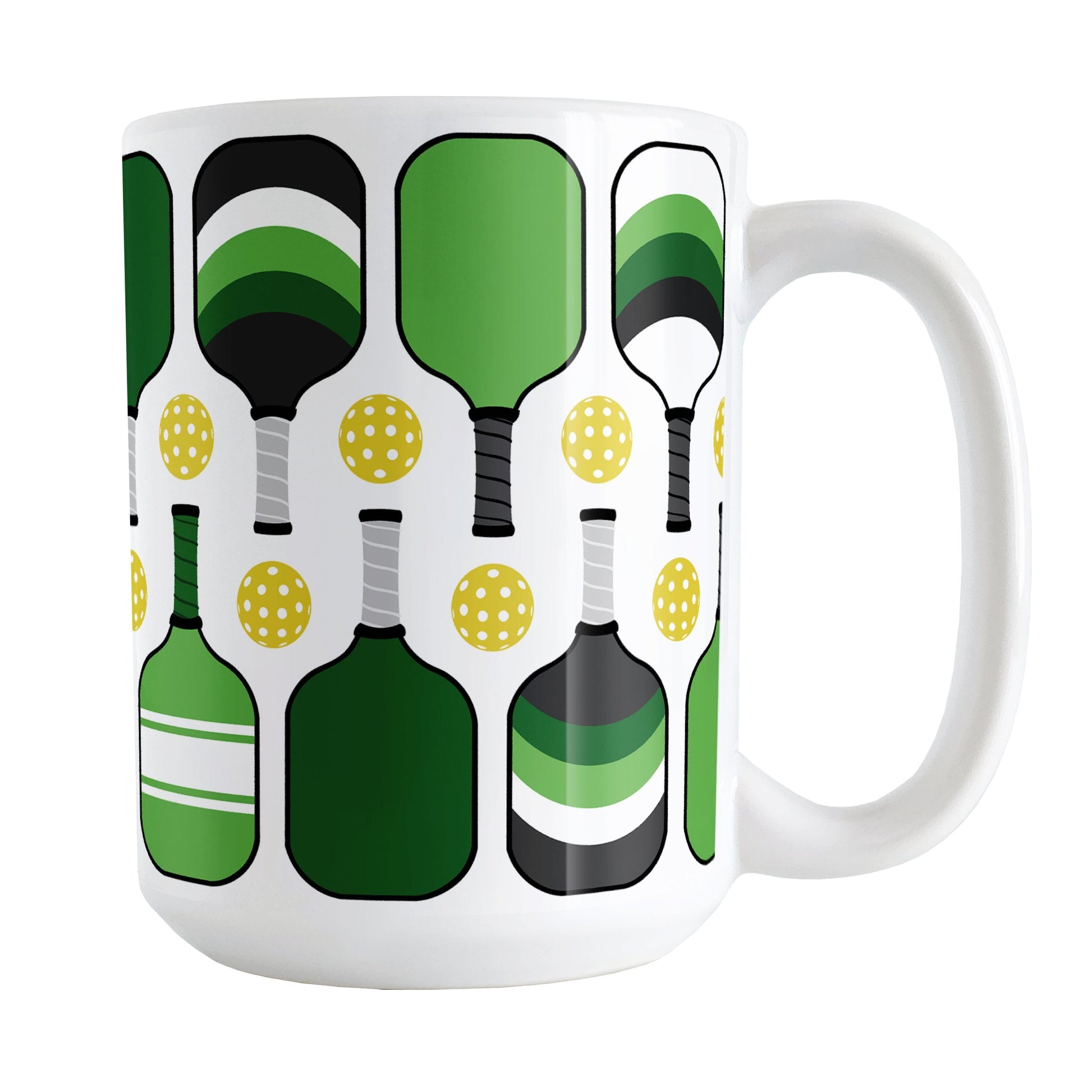 Green Pickleball Mug (15oz) at Amy's Coffee Mugs. A ceramic coffee mug designed with modern green pickleball paddles and yellow balls in a pattern that wraps around the mug up to the handle.