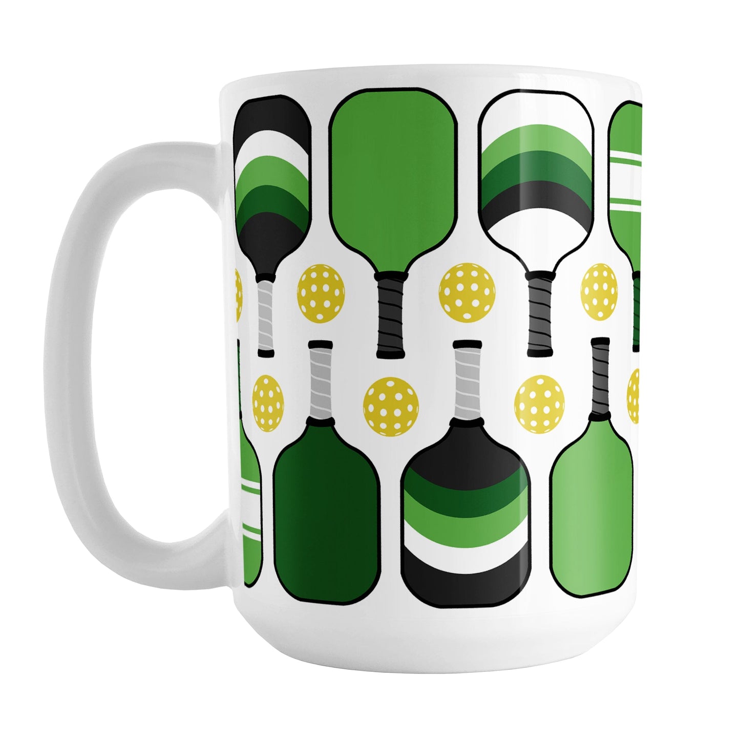 Green Pickleball Mug (15oz) at Amy's Coffee Mugs. A ceramic coffee mug designed with modern green pickleball paddles and yellow balls in a pattern that wraps around the mug up to the handle.