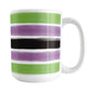 Mug with horizontal stripes in green, purple, black, and white on a white background