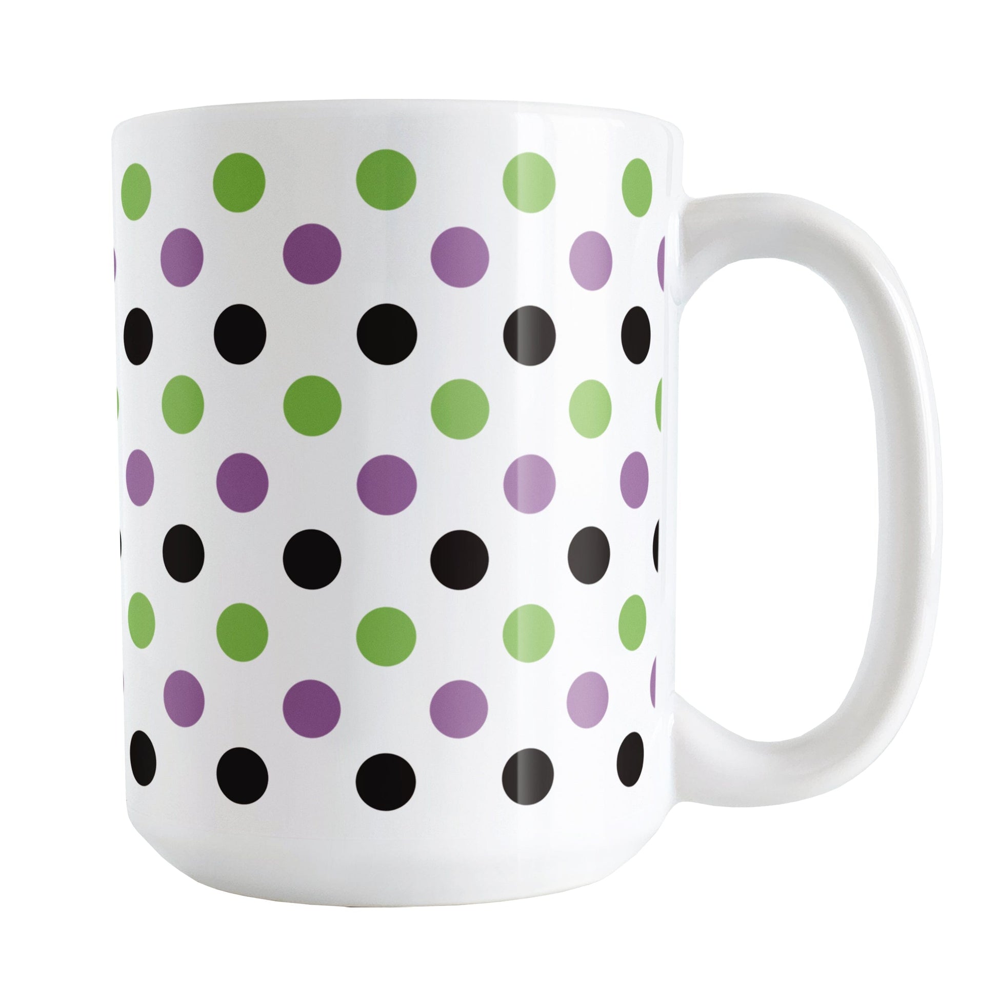 White mug with colorful polka dot pattern in green, purple, and black, on a white background