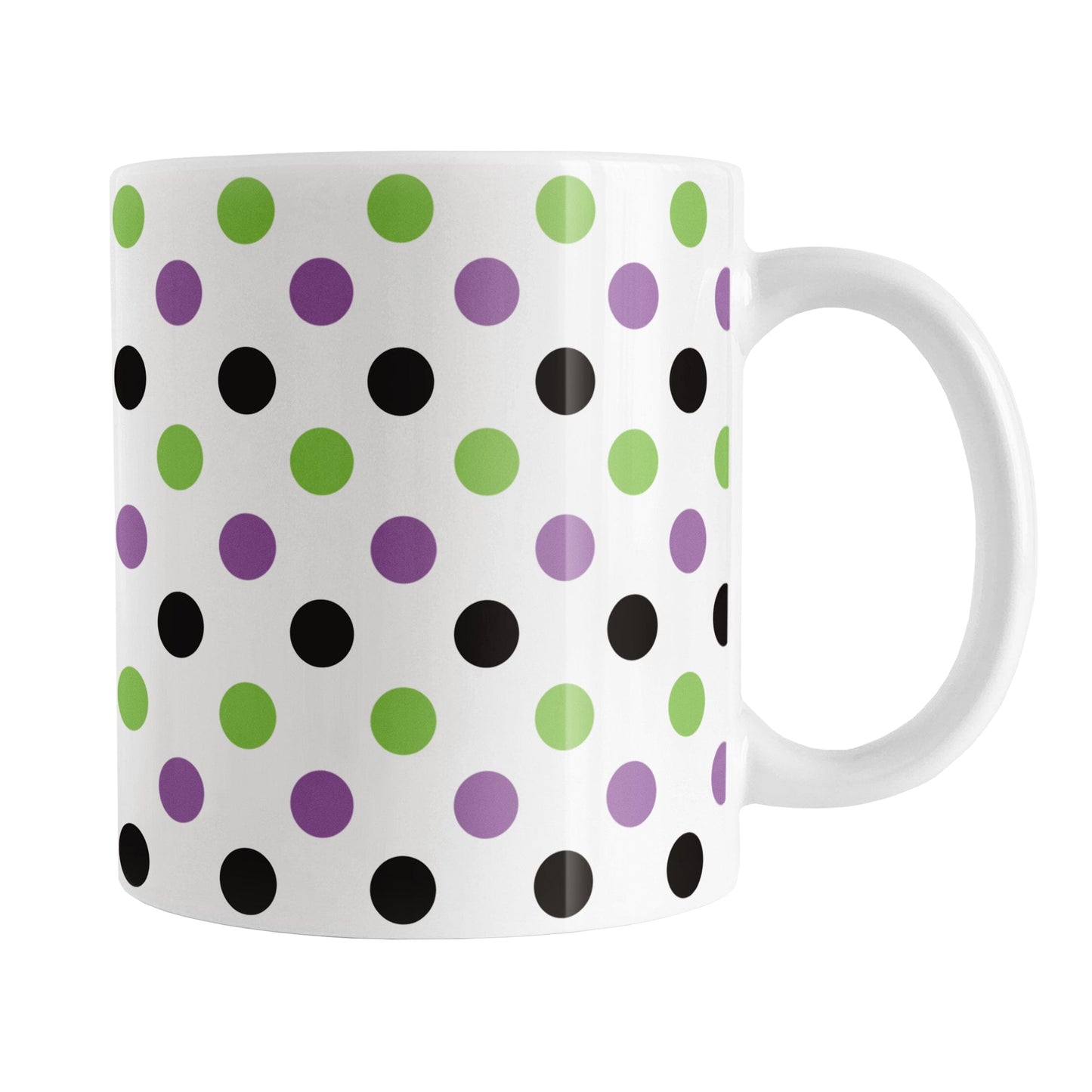 White mug with a pattern of green, purple, and black dots on a white background