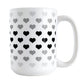 Hearts in Black Mug (15oz) at Amy's Coffee Mugs. A ceramic coffee mug designed with hearts in different shades of black and gray, with black across the middle and the lighter gray along the top and bottom, in a pattern that wraps around the mug to the handle. 