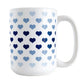 Hearts in Blue Mug (15oz) at Amy's Coffee Mugs. A ceramic coffee mug designed with hearts in different shades of blue, with the darker navy blue color across the middle and the lighter blue along the top and bottom, in a pattern that wraps around the mug to the handle.