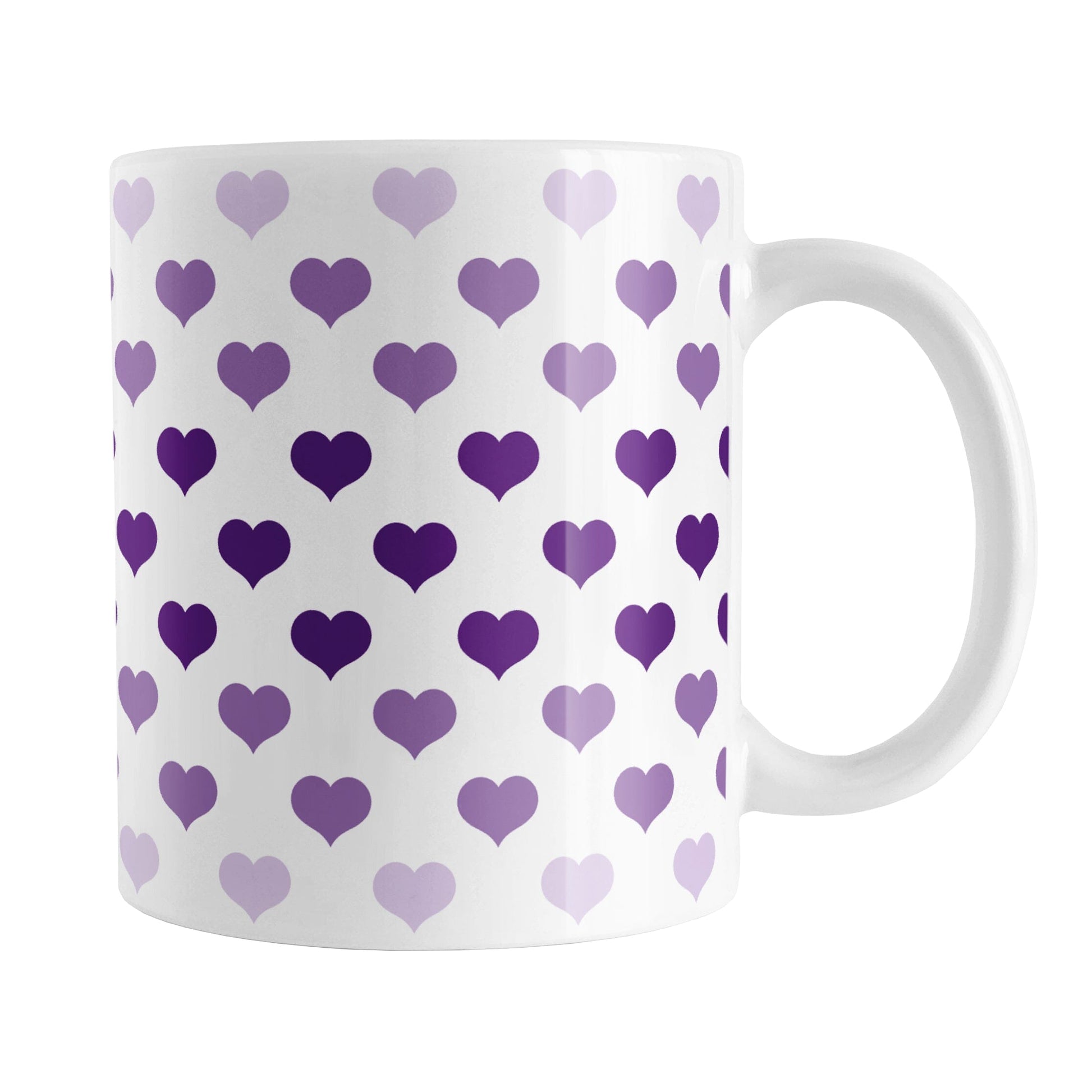 Hearts in Purple Mug (11oz) at Amy's Coffee Mugs. A ceramic coffee mug designed with hearts in different shades of purple, with the darker purple color across the middle and the lighter purple along the top and bottom, in a pattern that wraps around the mug to the handle.