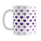 Hearts in Purple Mug (15oz) at Amy's Coffee Mugs. A ceramic coffee mug designed with hearts in different shades of purple, with the darker purple color across the middle and the lighter purple along the top and bottom, in a pattern that wraps around the mug to the handle.