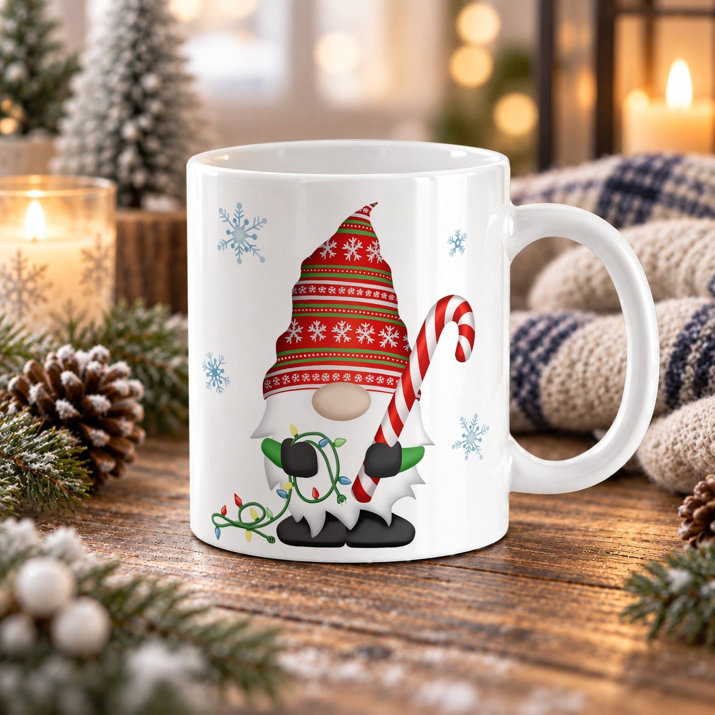 An 11 oz white ceramic mug with a Christmas gnome illustration, set on a wooden table surrounded by holiday decorations like pinecones, evergreen branches, and warm glowing candles.