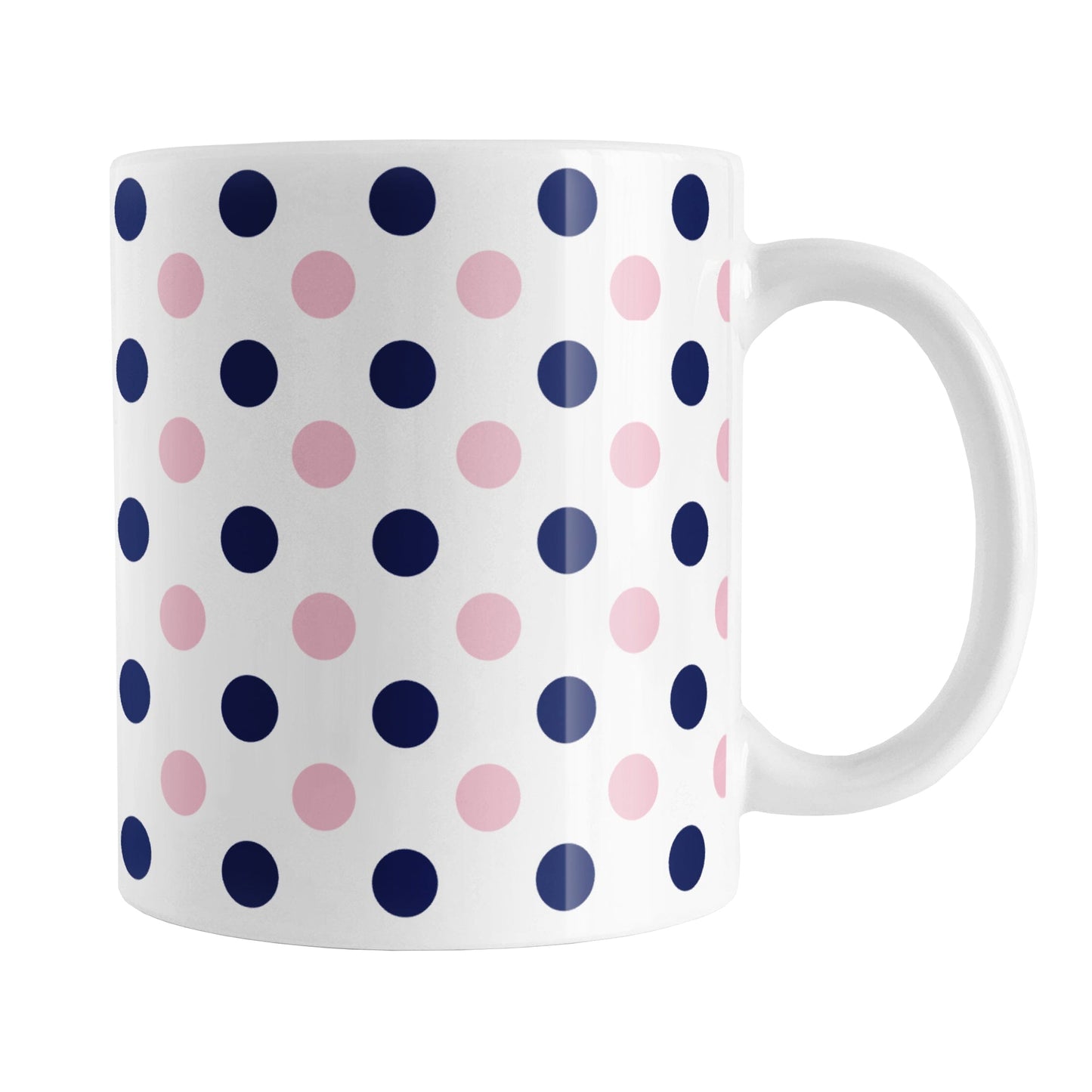 Navy Pink Polka Dot Mug (11oz) at Amy's Coffee Mugs. A ceramic coffee mug designed with polka dots in navy blue and pink over white in a pattern that wraps around the mug up to the handle.