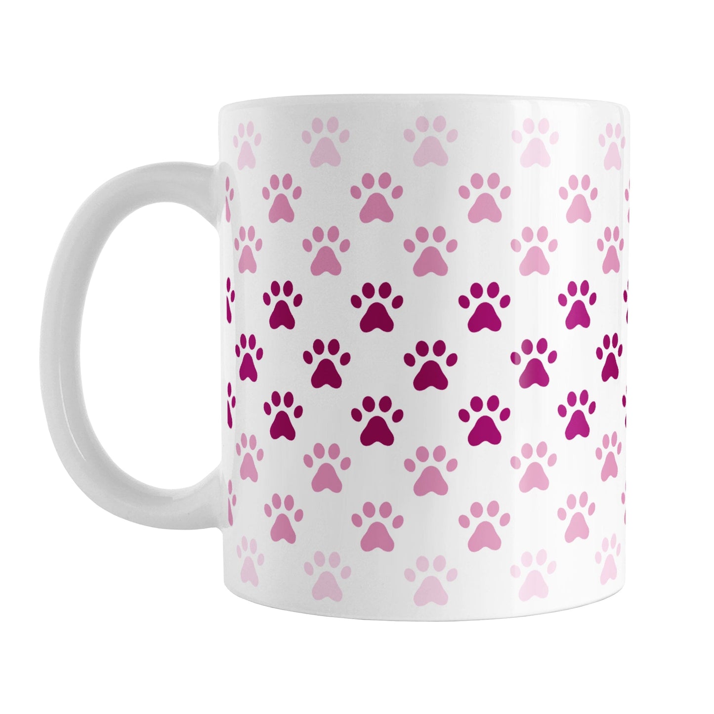 Paw Prints in Pink Mug (11oz) at Amy's Coffee Mugs. A ceramic coffee mug designed with paw prints in different shades of pink, with the darker pink color across the middle and the lighter pink along the top and bottom, in a pattern that wraps around the mug to the handle.