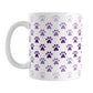 Paw Prints in Purple Mug (11oz) at Amy's Coffee Mugs. A ceramic coffee mug designed with paw prints in different shades of purple, with the darker purple color across the middle and the lighter purple along the top and bottom, in a pattern that wraps around the mug to the handle.